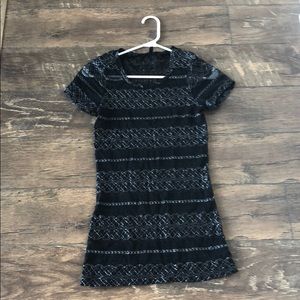 Black top with silver design.